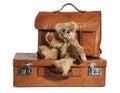 Well-Traveled Vintage Suitcase and Teddy Bear Royalty Free Stock Photo