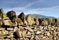 Drystone Wall with Diamond Shaped Top Stone Royalty Free Stock Photo