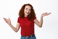 Well what can I say. Smiling humble redhead girl shrugging shoulders, cant tell nothing and looking clueless, dont know