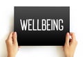 Wellbeing - complex combination of a person`s physical, mental, emotional and social health factors, text concept on card Royalty Free Stock Photo