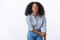 Wellbeing happiness people concept. Entertained charming friendly carefree african american woman curly-haired bending Royalty Free Stock Photo