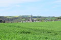 Welling, Germany - 05 09 2021: Village Welling behind green grain fields Royalty Free Stock Photo