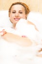 Wellness and Beauty Concepts. Caucasian Woman Relaxing in Bath Royalty Free Stock Photo