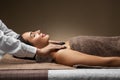 Beautiful woman having hot stone massage at spa Royalty Free Stock Photo