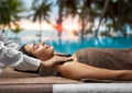 beautiful woman having hot stone massage at spa Royalty Free Stock Photo