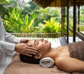 woman having face and head massage at spa Royalty Free Stock Photo