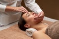 Woman having face and head massage at spa Royalty Free Stock Photo