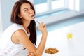 Wellness concept. Woman having breakfast and smiling. Healthy ea Royalty Free Stock Photo