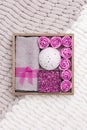 Wellness gift box with lavender flowers and lavender aroma, bath bomb, sea salt, bath roses, towel. Royalty Free Stock Photo