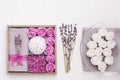 Wellness gift box with lavender flowers and lavender aroma, bath bomb, sea salt, bath roses, towel. Present for woman Royalty Free Stock Photo