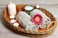 Spa concept with candles, towels and gerber flower Royalty Free Stock Photo