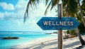 Wellness sign board arrow on beach with sunshine background Royalty Free Stock Photo