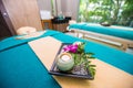 Wellness and spa concept with candles and orchid Royalty Free Stock Photo