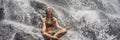 Wellness spa, vacation and yoga meditation concept. Young woman sitting in lotus position on the rock in tropical Royalty Free Stock Photo