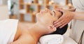 Wellness, spa and woman getting facial massage in beauty salon to relax. Calm, peace and luxury treatment for skin