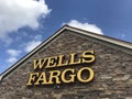 Davie, Florida, USA - Feb 2,2020: A Wells Fargo Bank sign at a Wells Fargo Facade nice sky in the background.