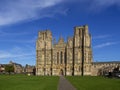 WELLS, SOMERSET, ENGLAND, UK - MARCH 16 2020: View of the Cathedral and grounds. Sunny day. Royalty Free Stock Photo