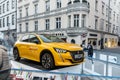 Wels, Austria - January 11th,2020: Newest Peugeot 208 gt-line 2020 model stand on basement among public skating rink in center old