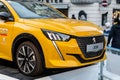 Wels, Austria - January 11th,2020: Newest Peugeot 208 gt-line 2020 model stand on basement among public skating rink in center old