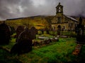 Welsh church and cemetery foggy