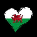 Welsh flag heart-shaped grunge background. Vector illustration. Royalty Free Stock Photo