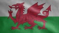 Welsh flag waving in the wind. Close up of Wales banner blowing soft silk Royalty Free Stock Photo