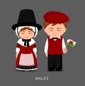 Welsh in national dress with a flag.
