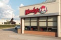 tor, canada - august 10, 2023: wendys restaurant logo on building store above windows exterior outside summer. p