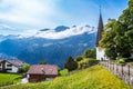 Wengen town in Switzerland. View over Swiss Alps near Lauterbrunnen valley. Church and houses in Wengen. Mountain peak Royalty Free Stock Photo