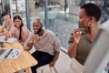 Were all happy when we work together. a group of young businesspeople having a discussion at the office. Royalty Free Stock Photo