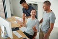 So...were all on the same page. High angle shot of three designers working together on a project in an office. Royalty Free Stock Photo