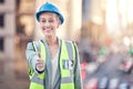 Were all set. Cropped portrait of an attractive female construction worker giving thumbs up while standing on a building Royalty Free Stock Photo