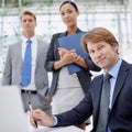 Were the best in the business. Portrait of a group of serious business executives in a boardroom. Royalty Free Stock Photo