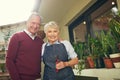 Were enjoying the free time retirement brings. Portrait of a loving senior couple garedening outside.