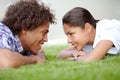 Were a great match. a happy young couple gazing into each others eyes on the lawn. Royalty Free Stock Photo