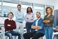 Were here to put in the work. Portrait of a team of young go getters working in a modern office. Royalty Free Stock Photo