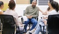 Were here for you. a group of businesspeople having a casual meeting in a boardroom and showing support to their Royalty Free Stock Photo