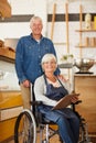 Were just not ready to retire yet. Portrait of two happy senior business owners posing together inside their coffee shop