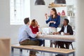 Were moving on to the next level. an attractive young businesswoman addressing her team during a meeting. Royalty Free Stock Photo