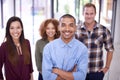 Were persistent in our search for success. Portrait of a team of designers standing together in an office. Royalty Free Stock Photo