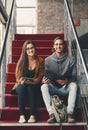 Were prepping for our finals. Full length portrait of two young university students studying while sitting on a Royalty Free Stock Photo