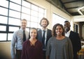 Were ready to be your dream team. Portrait of a diverse team of happy businesspeople posing together in their office. Royalty Free Stock Photo