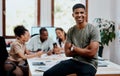 Were about to change this industry for the better. Portrait of a confident young businessman with his team having a Royalty Free Stock Photo