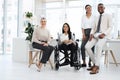 Were the winning team. Full length portrait of a group of diverse businesspeople gathered in their office.