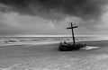Wereck boat on the beach with storm cloud Royalty Free Stock Photo