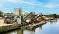 Sand and gravel plant at river Maas with cargo ship