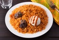 West Africa Rice Jollof with Beef and Boiled Egg Royalty Free Stock Photo