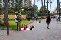 West African street traders selling sun glasses handbags and watches sell their wares on the promenade in Playa Las Americas in Te