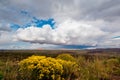 West American Highway, vast fields, rain in the distance Royalty Free Stock Photo