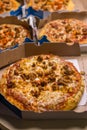 West Bangal, India - August 21, 2021 : Dominos pizza on box stock image.